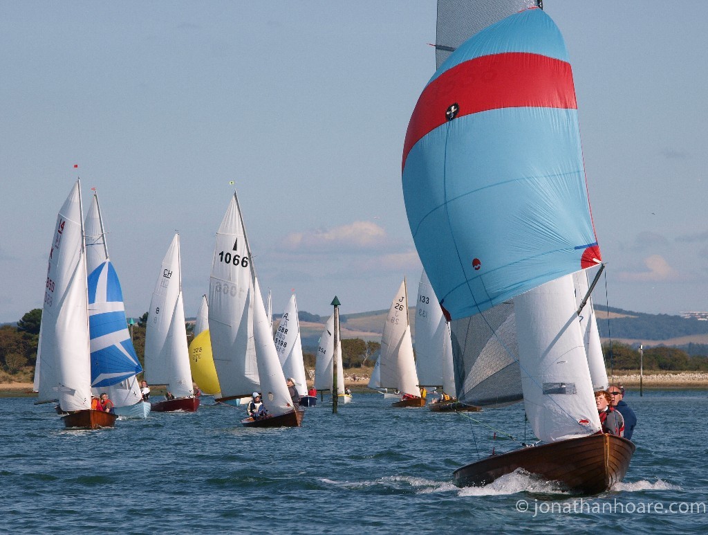 Classic Merlin Rocket 774 leads a gaggle of National 18's, Jollyboats, International 14's and Albacores at the 2012 Bosham Classic Boat Revival - Bosham Classic Boat Revival © Jonathan Hoare